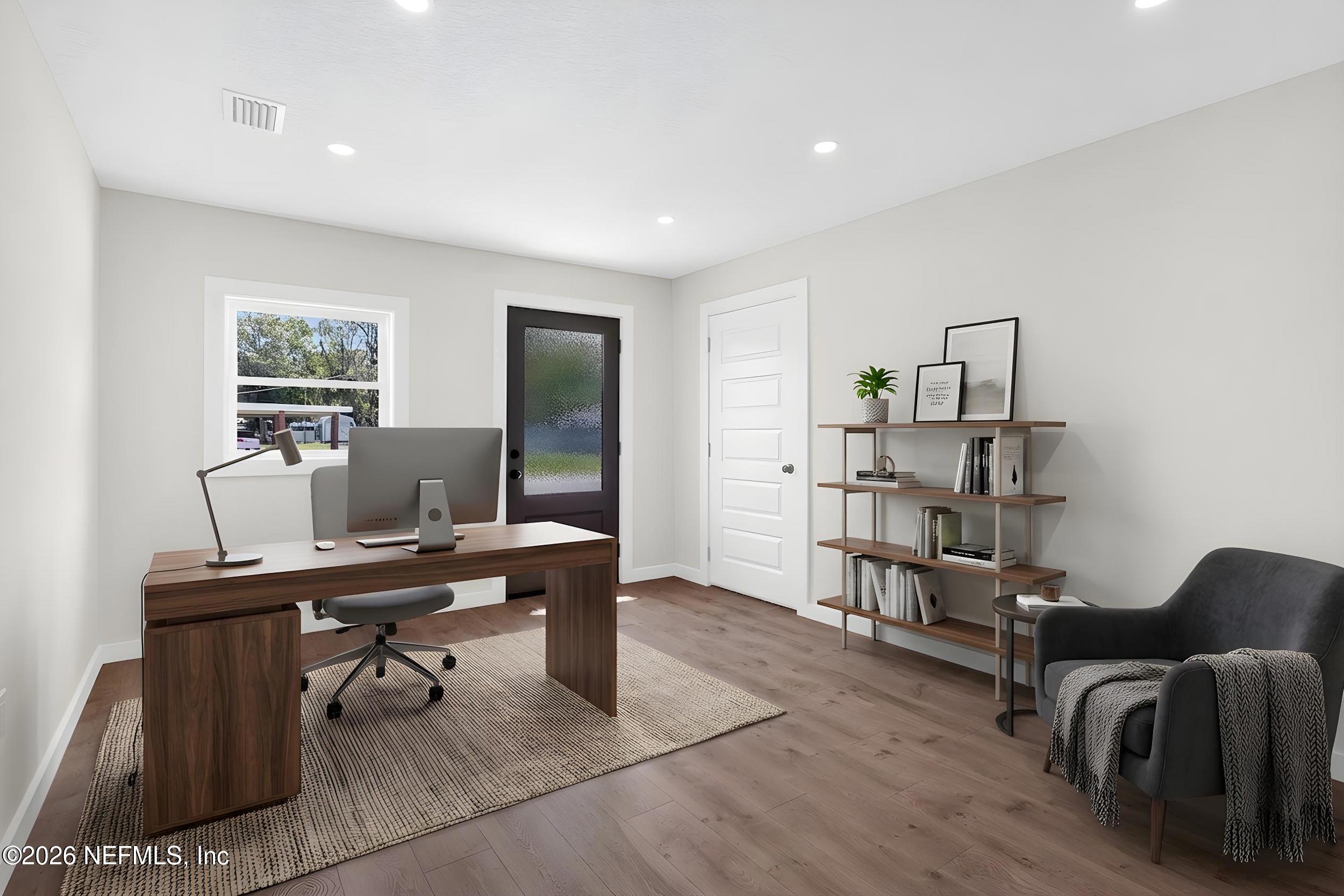 1132 5th Street St. Augustine, FL 32095 - Photo 25 of 34 a view of a workspace with furniture and a workspace