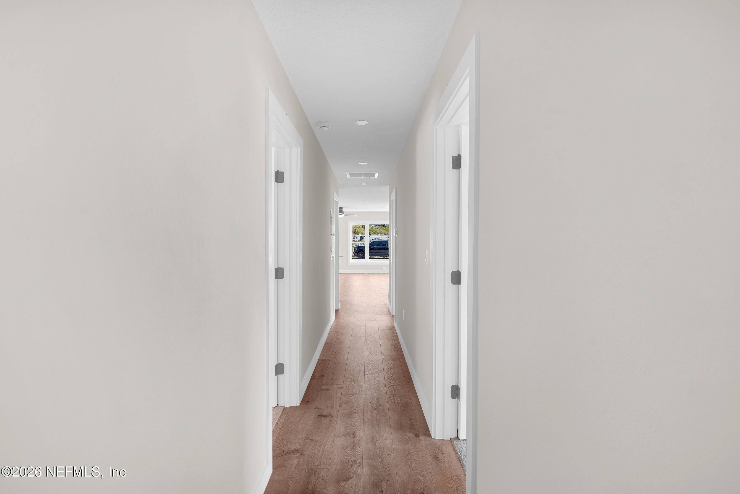 1132 5th Street St. Augustine, FL 32095 - Photo 30 of 34 a view of a hallway with wooden floor
