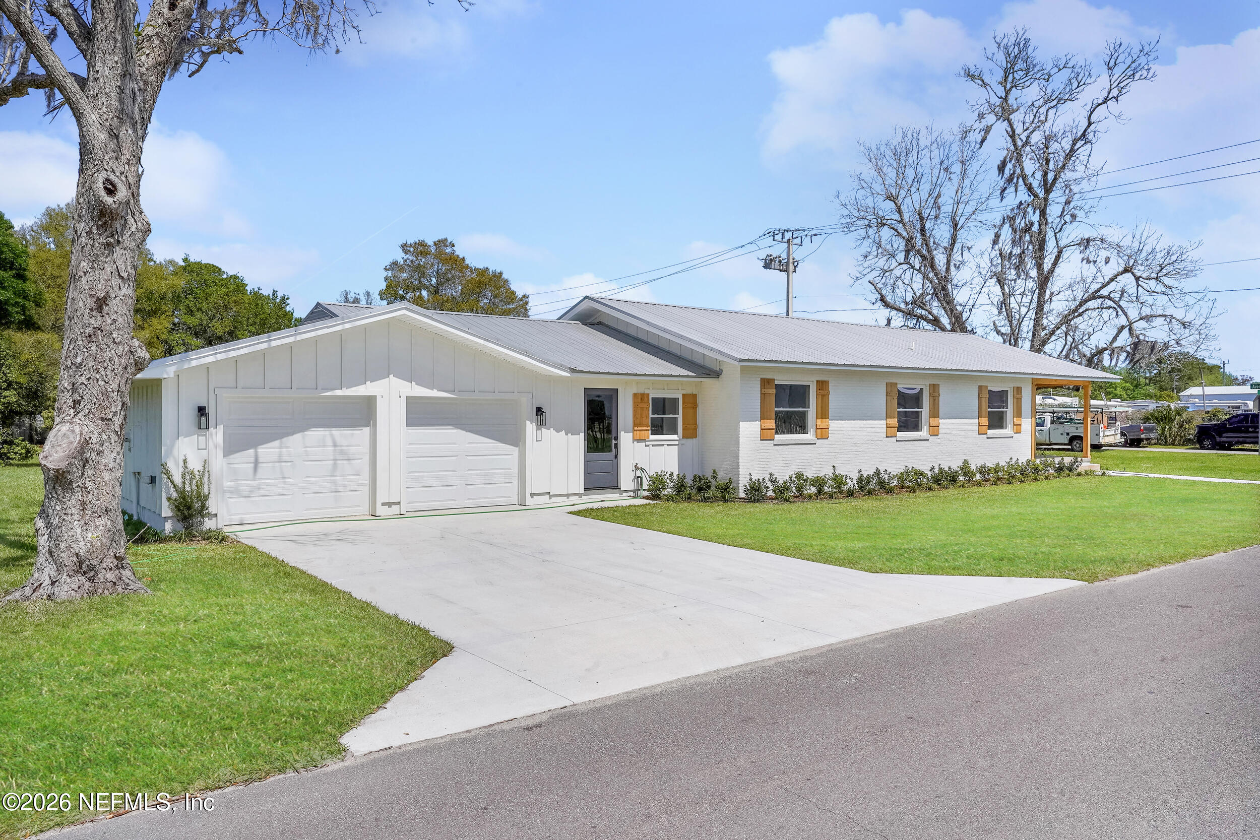 1132 5th Street St. Augustine, FL 32095 - Photo 4 of 34 front view of a house and a yard