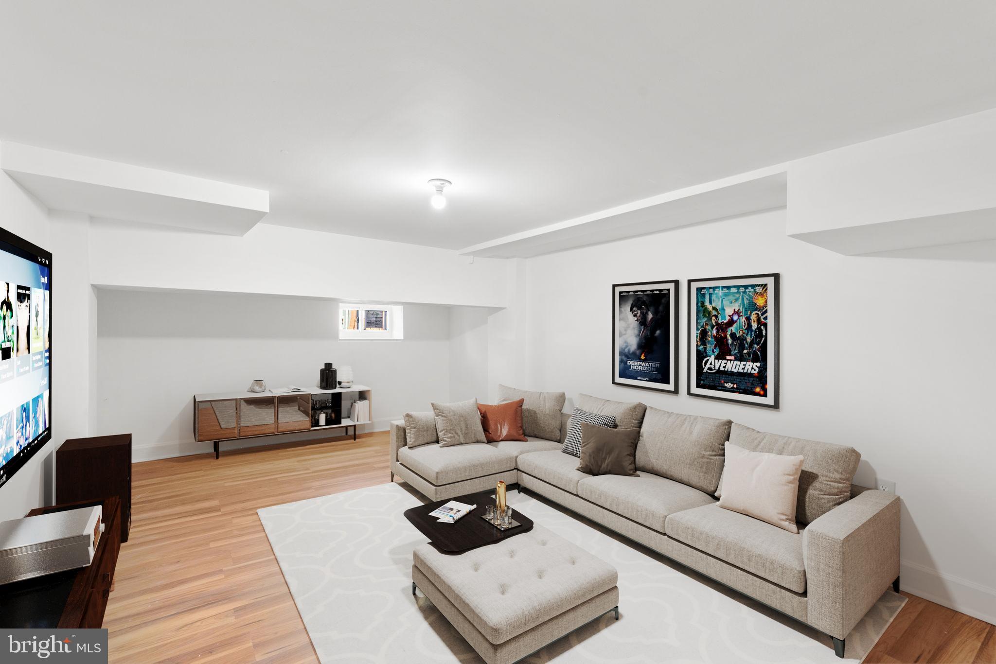 1731 Cliftview Avenue Baltimore, MD 21213 - Photo 22 of 33 a living room with furniture and a couch