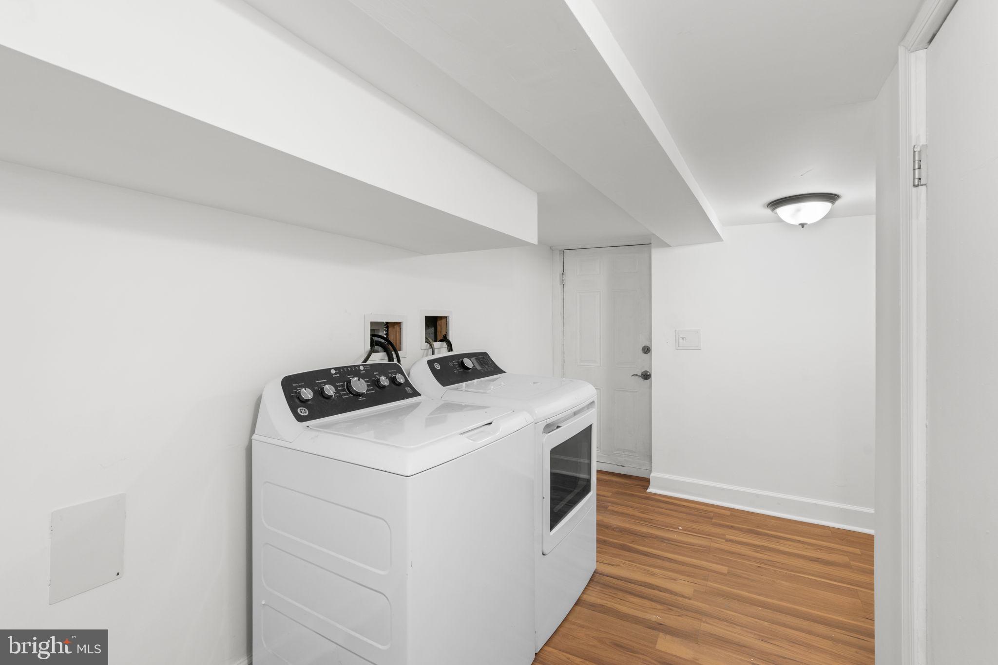 1731 Cliftview Avenue Baltimore, MD 21213 - Photo 26 of 33 a utility room with dryer and washer