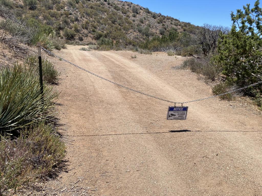 28 Hughes Canyon Acton, CA 93510 - Photo 51 of 52 a view of a dry yard with trees in the background