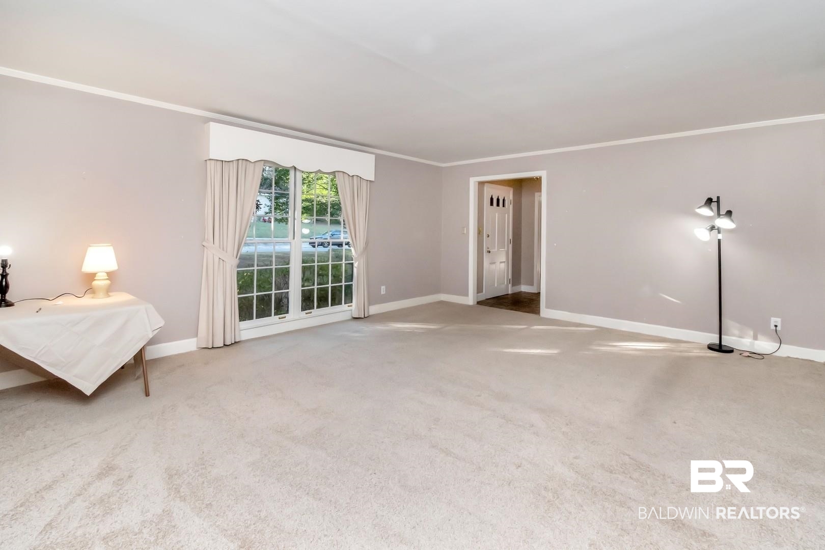 308 Brawood Drive Mobile, AL 36608 - Photo 4 of 33 Spare room with carpet and crown molding