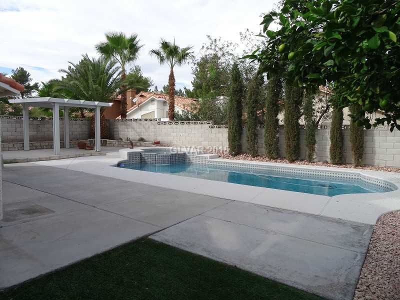 2800 Mirage Road Henderson, NV 89074 - Photo 28 of 35 Swimming Pool/Hot Tub/Sauna. Backyard with pool, spa and covered patio.