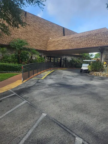 a living room with lots of furniture and a wooden floor