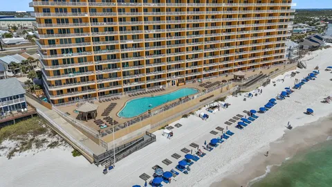 a view of a balcony with wooden floor
