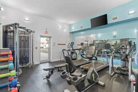 a view of a room with gym equipment