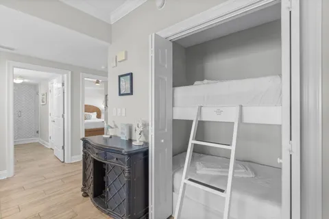 a view of a dining room with furniture and a chandelier
