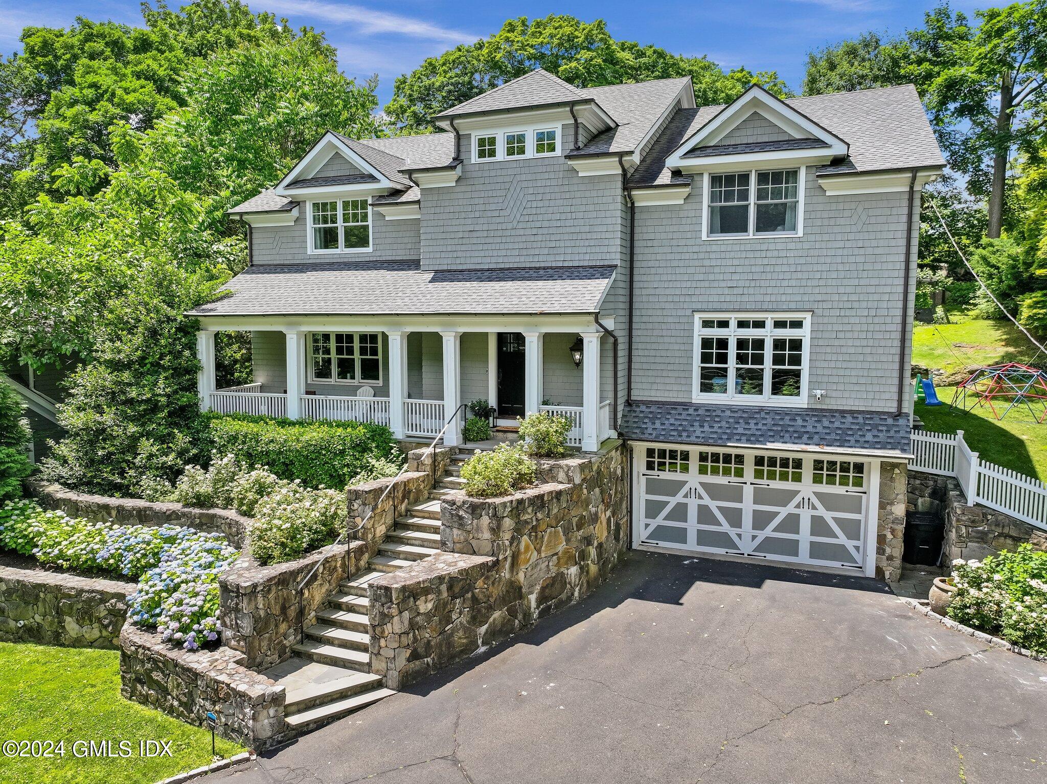 16 Laddins Rock Road Old Greenwich, CT 06870 - Photo 1 of 23 1-web-or-mls-16-laddins-rock-rd