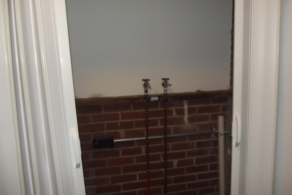 1702 42nd Street Columbus, GA 31904 - Photo 12 of 13 a bathroom with a shower and a sink