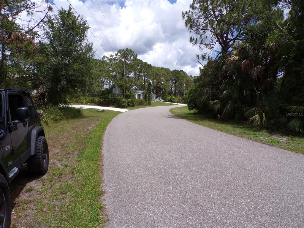 Embassy Rd Port North Port, FL 34291 - Photo 12 of 12 a view of a lake with a big yard