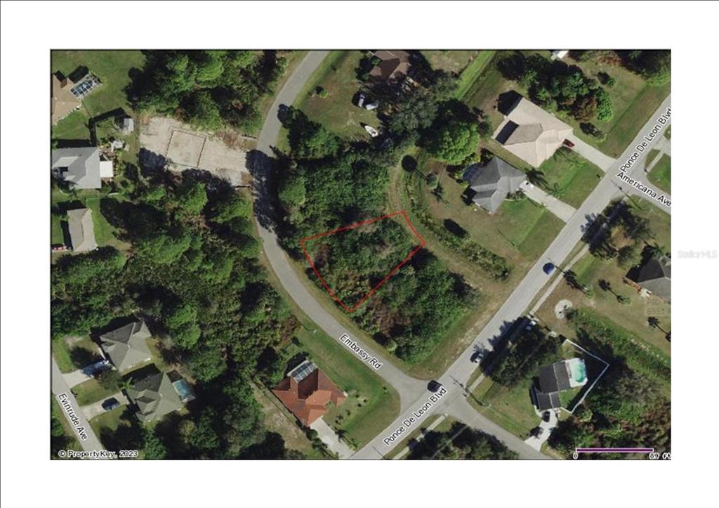 Embassy Rd Port North Port, FL 34291 - Photo 10 of 12 an aerial view of a house with a yard