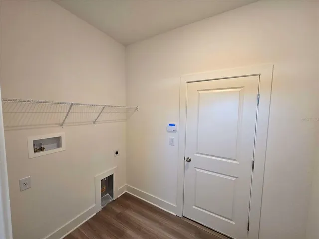 a view of small space with wooden floor