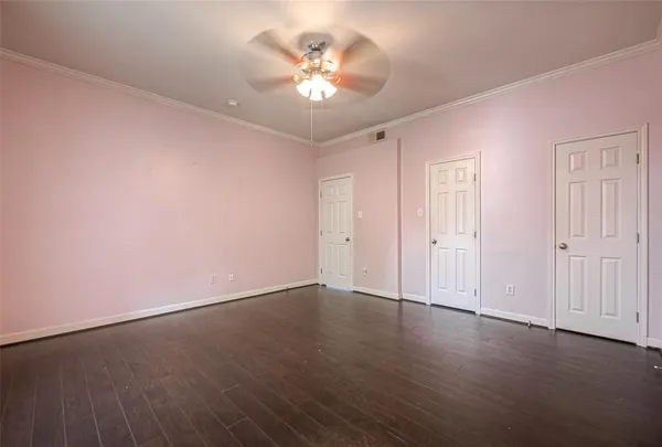 a bathroom with a bathtub a mirror a sink and a toilet