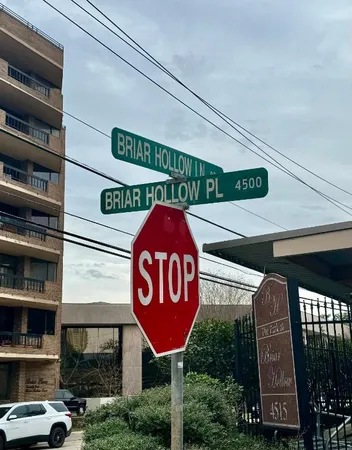 a sign broad on a pole