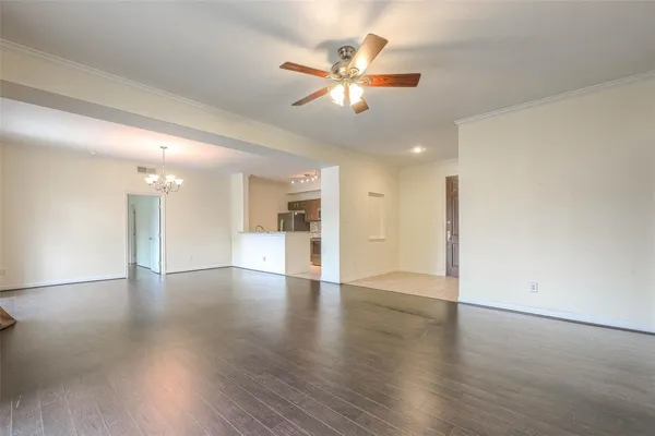 a view of a kitchen with a dishwasher cabinets and wooden floor