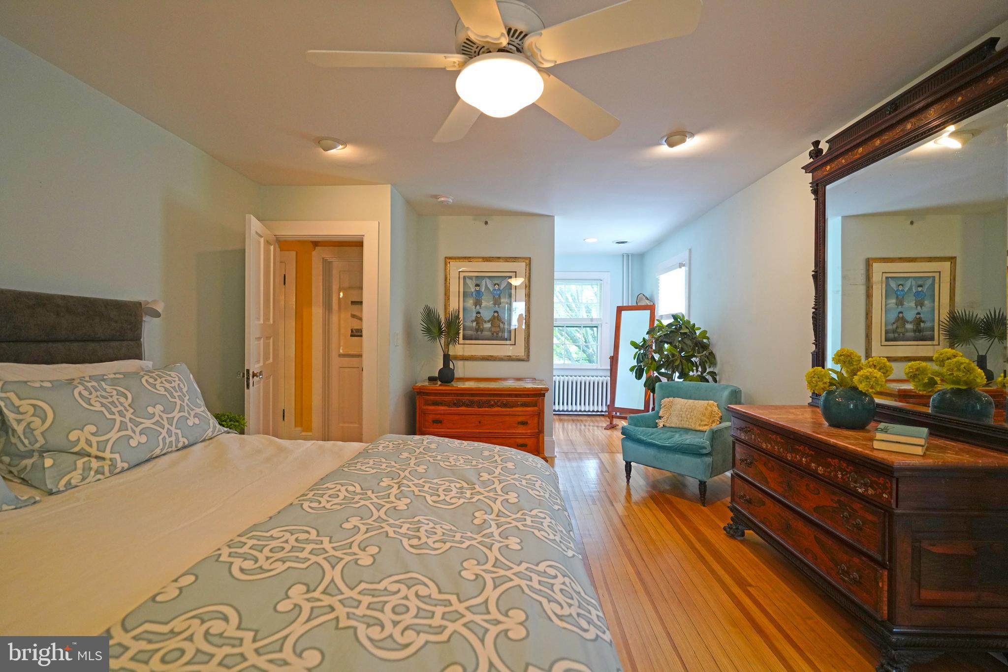240 2nd Street Lewes, DE 19958 - Photo 47 of 90 a bedroom with a bed and ceiling fan