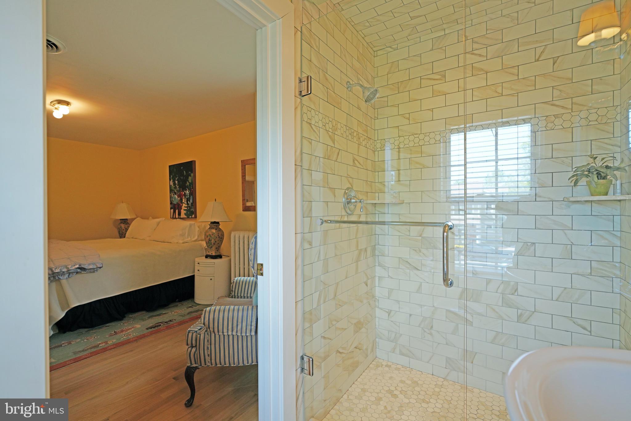 240 2nd Street Lewes, DE 19958 - Photo 58 of 90 a bathroom with a sink and mirror