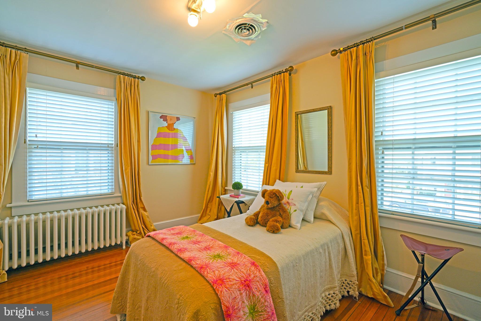 240 2nd Street Lewes, DE 19958 - Photo 60 of 90 a bedroom with a bed and windows