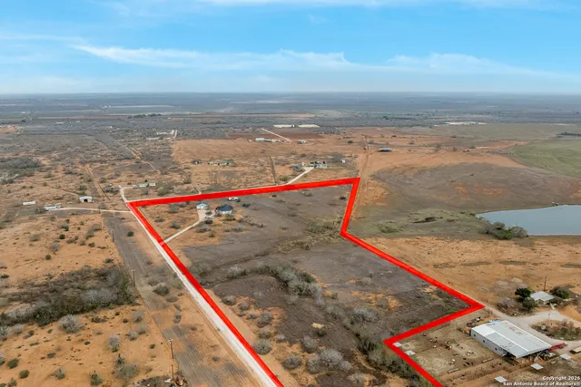 an aerial view of beach and ocean