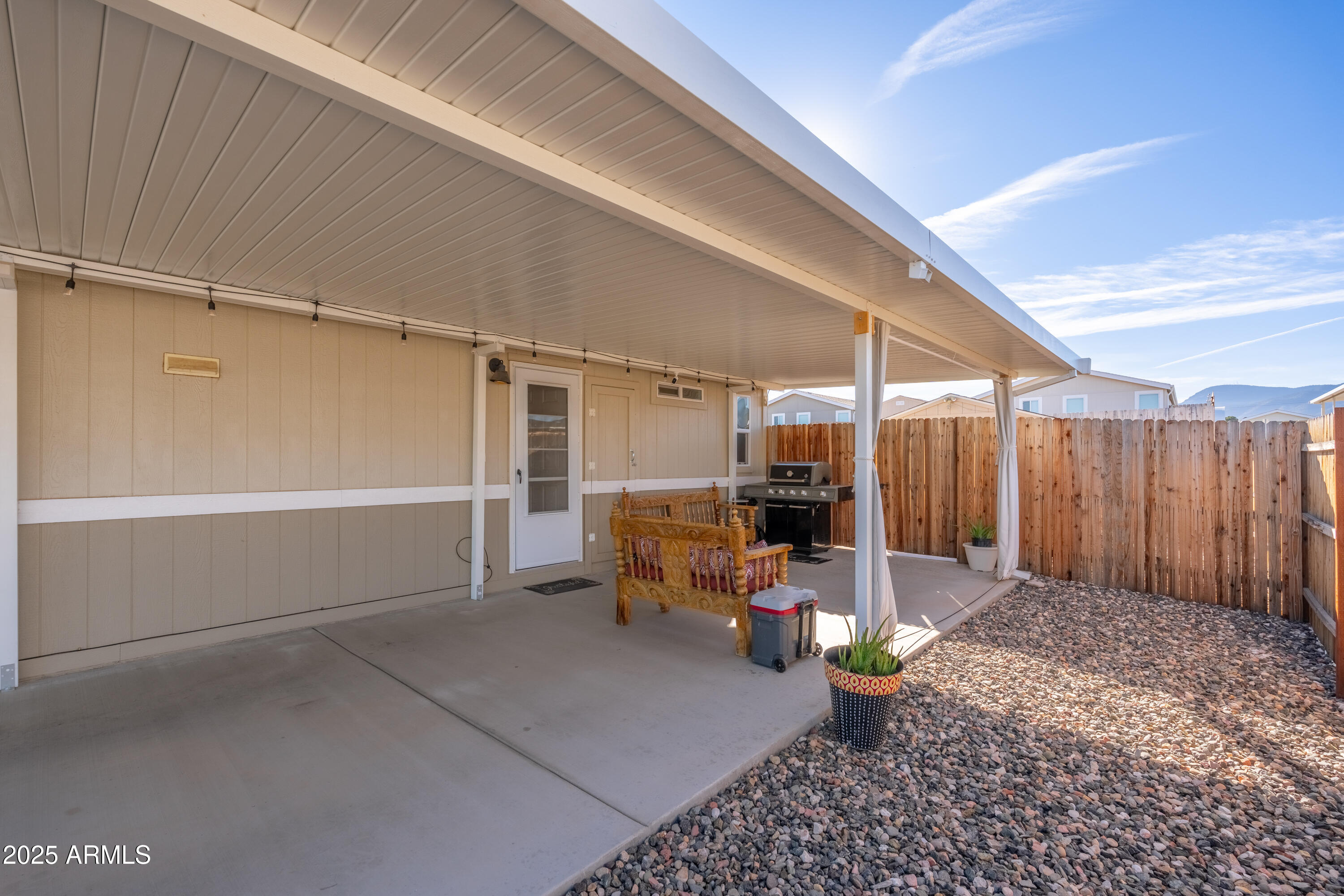 1033 Wheeler Road Camp Verde, AZ 86322 - Photo 26 of 51 a outdoor space with patio furniture and potted plants