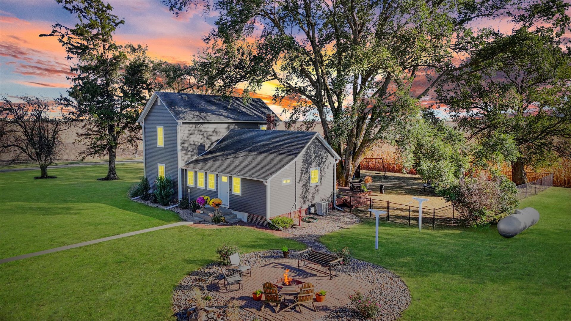 a view of a house with a yard