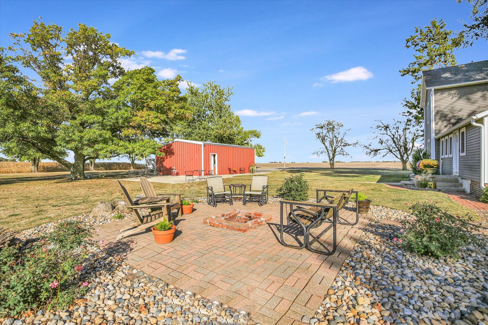 151 County 1700 Road East Villa Grove, IL 61956 - Photo 16 of 76 a view of a swimming pool with a patio