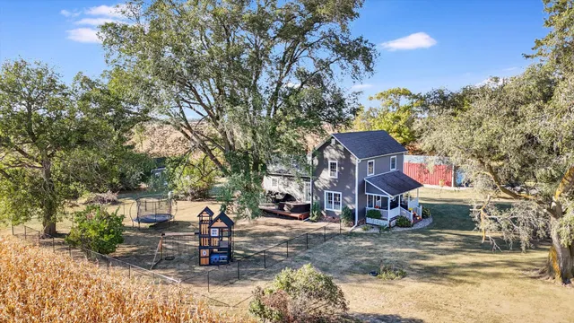 a front view of a house with dining area
