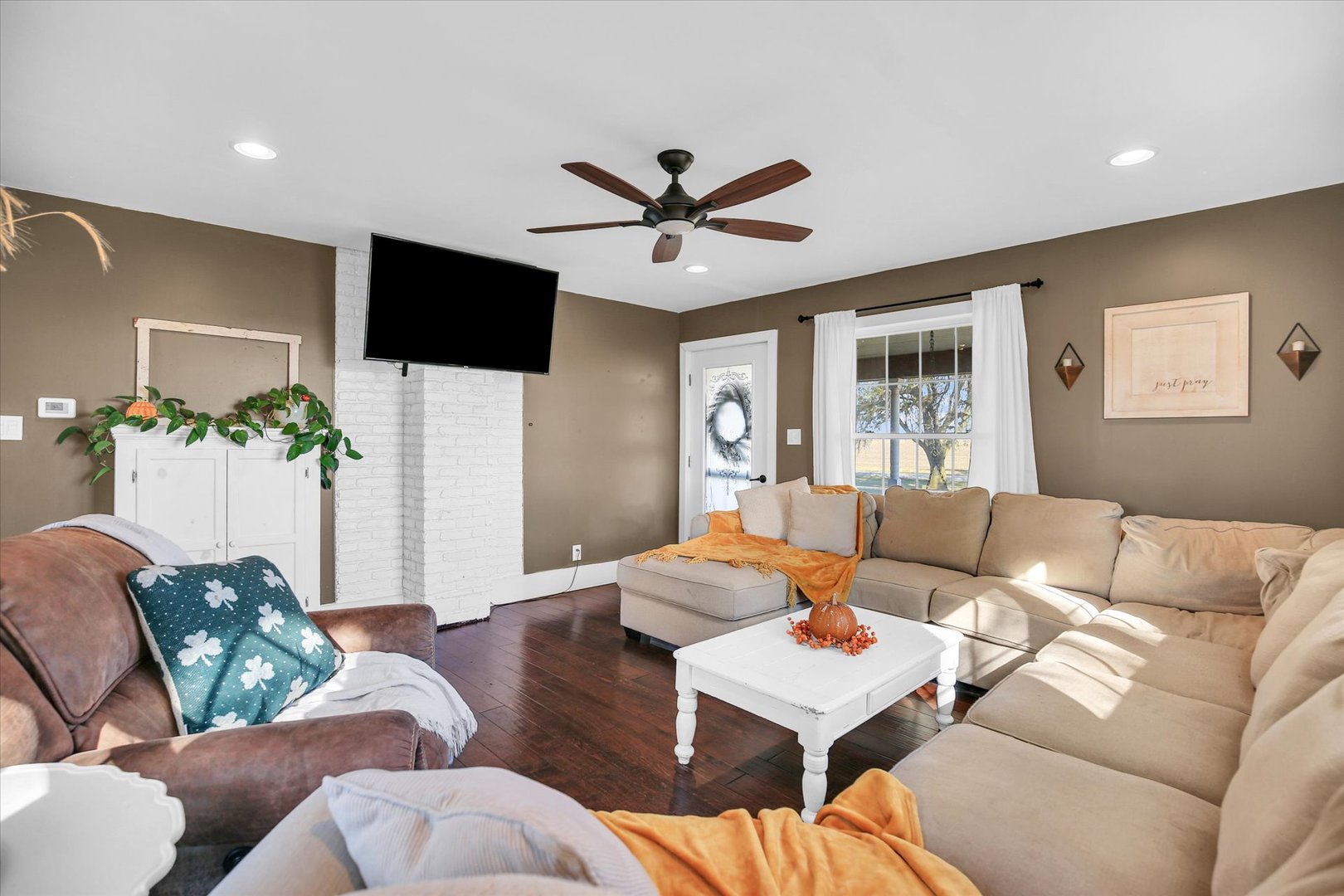 151 County 1700 Road East Villa Grove, IL 61956 - Photo 33 of 76 a living room with furniture and a flat screen tv