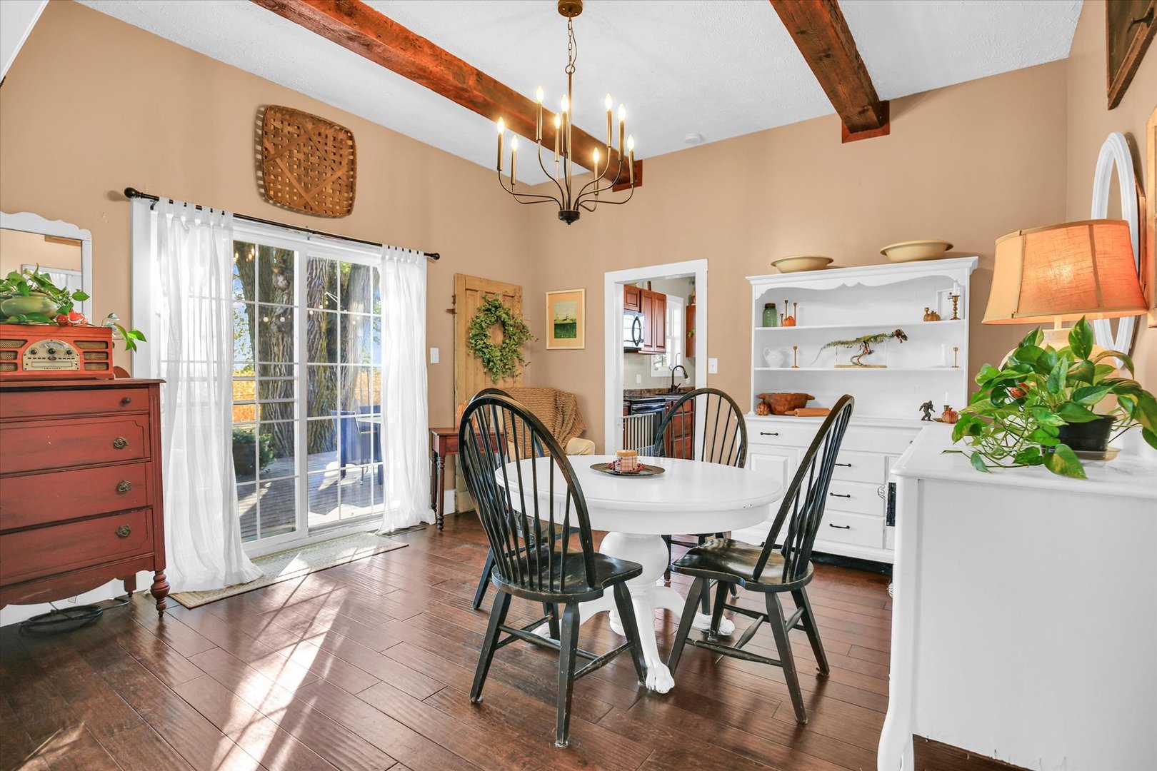 151 County 1700 Road East Villa Grove, IL 61956 - Photo 35 of 76 a view of a dining room with furniture window and wooden floor