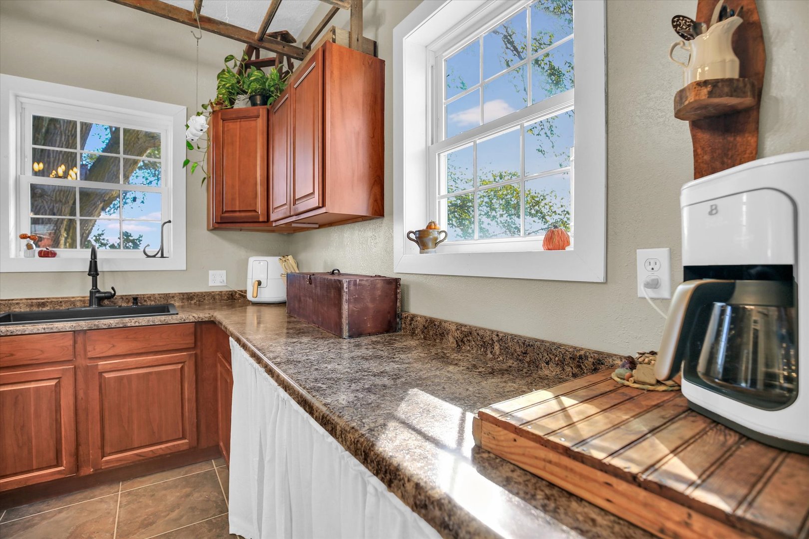 151 County 1700 Road East Villa Grove, IL 61956 - Photo 43 of 76 a kitchen with a stove a sink and a refrigerator