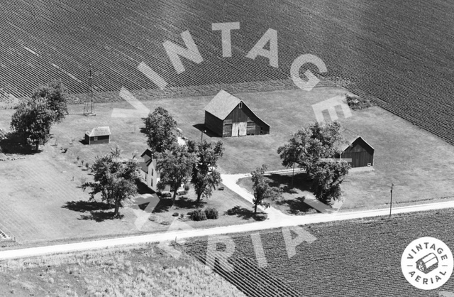 151 County 1700 Road East Villa Grove, IL 61956 - Photo 5 of 76 a view of a house with a fountain