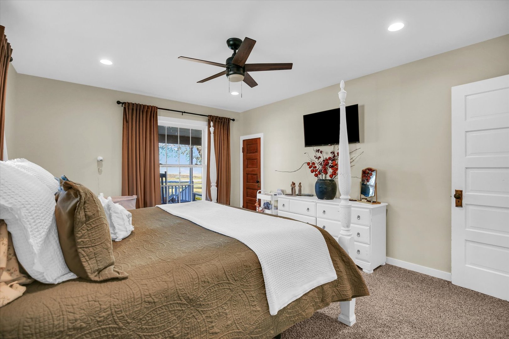 151 County 1700 Road East Villa Grove, IL 61956 - Photo 56 of 76 a bedroom with a bed and a flat screen tv