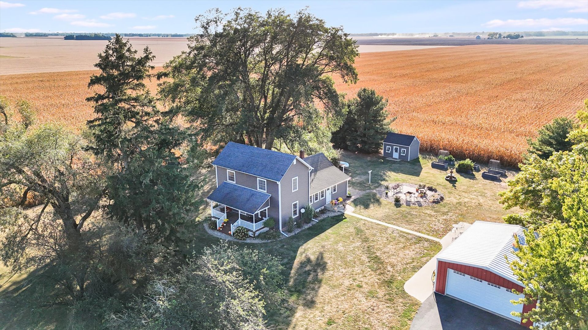151 County 1700 Road East Villa Grove, IL 61956 - Photo 8 of 76 a aerial view of a house with outdoor space and ocean view