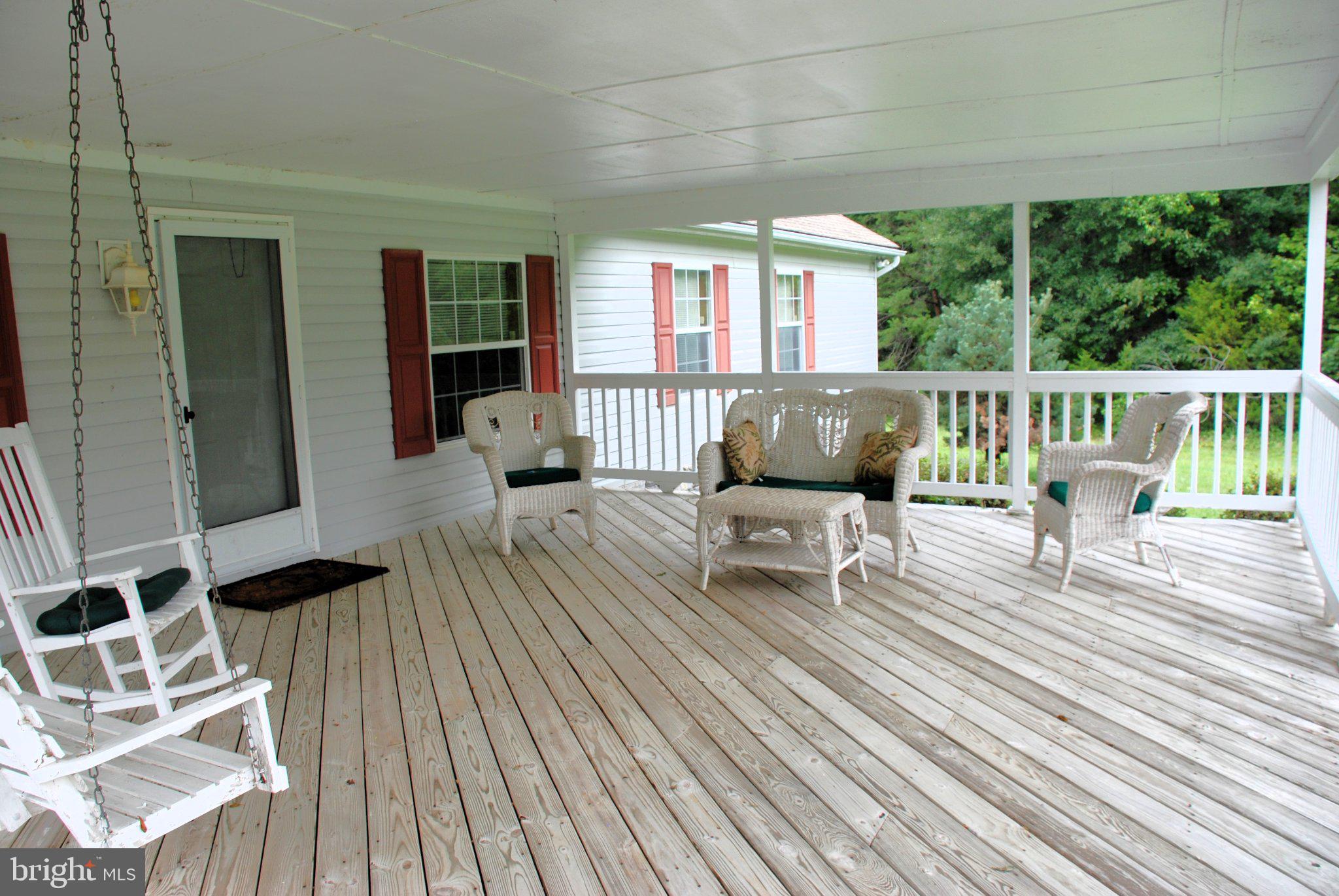 4508 Lewiston Road Bumpass, VA 23024 - Photo 11 of 84 Charming porch for serene moments.
