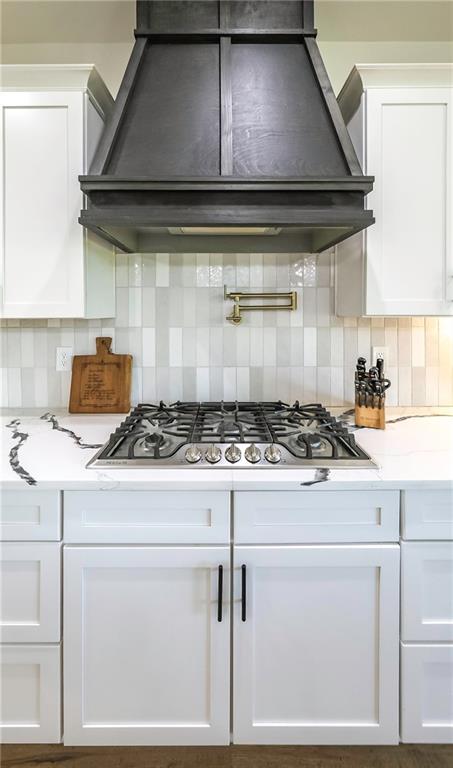 2392 Welcome Road Roopville, GA 30170 - Photo 33 of 65 a stove top oven sitting inside of a kitchen