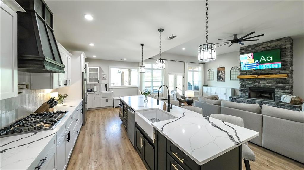 2392 Welcome Road Roopville, GA 30170 - Photo 35 of 65 a large kitchen with a table and chairs