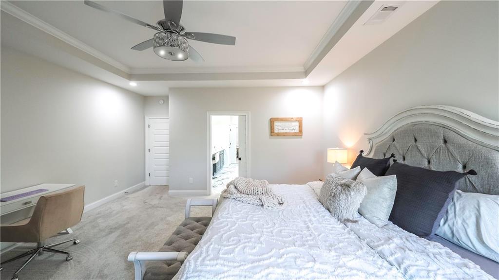 2392 Welcome Road Roopville, GA 30170 - Photo 60 of 65 a bedroom with a bed and window