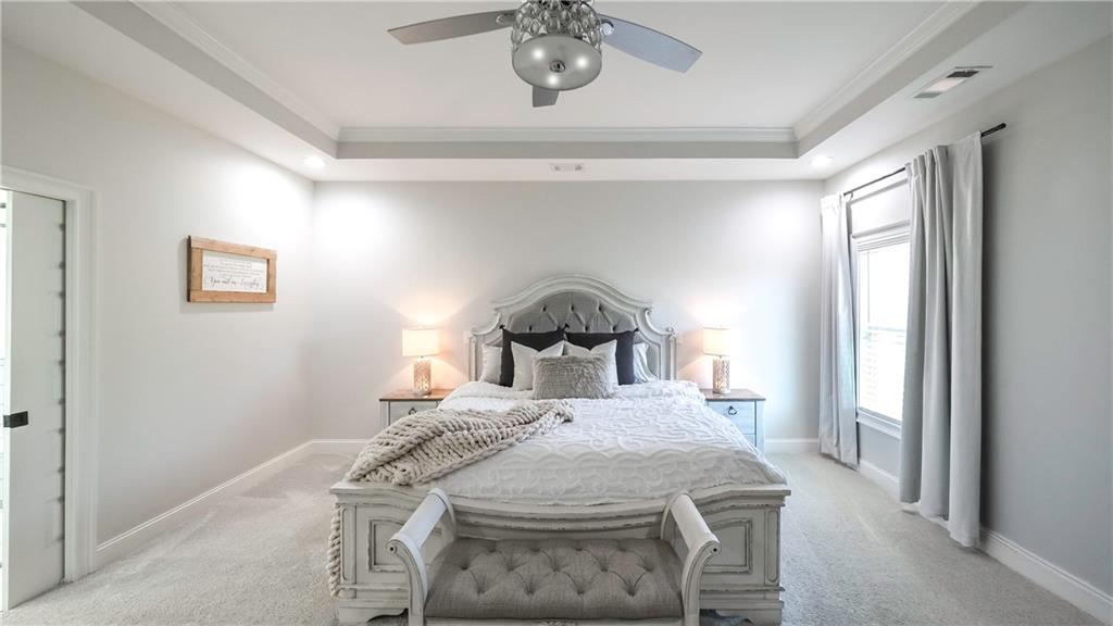 2392 Welcome Road Roopville, GA 30170 - Photo 63 of 65 a bedroom with a bed and a window