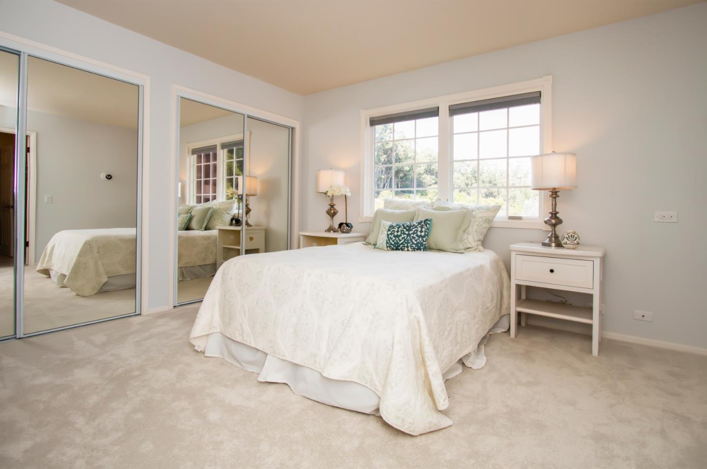 838 Capuchino Drive Millbrae, CA 94030 - Photo 11 of 14 a bedroom with a bed and a large window