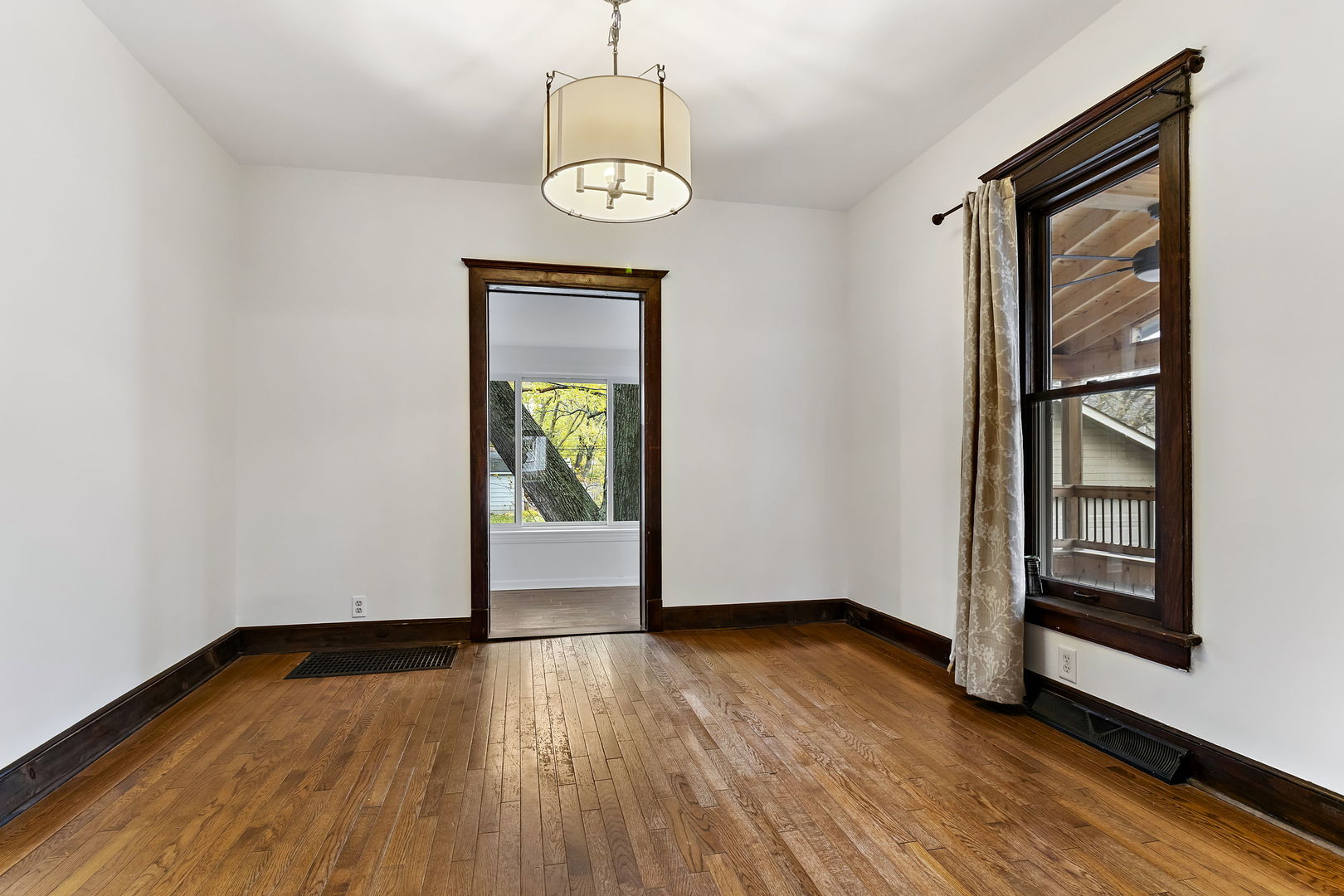 116 South West Street Naperville, IL 60540 - Photo 11 of 35 an empty room with wooden floor closet and windows