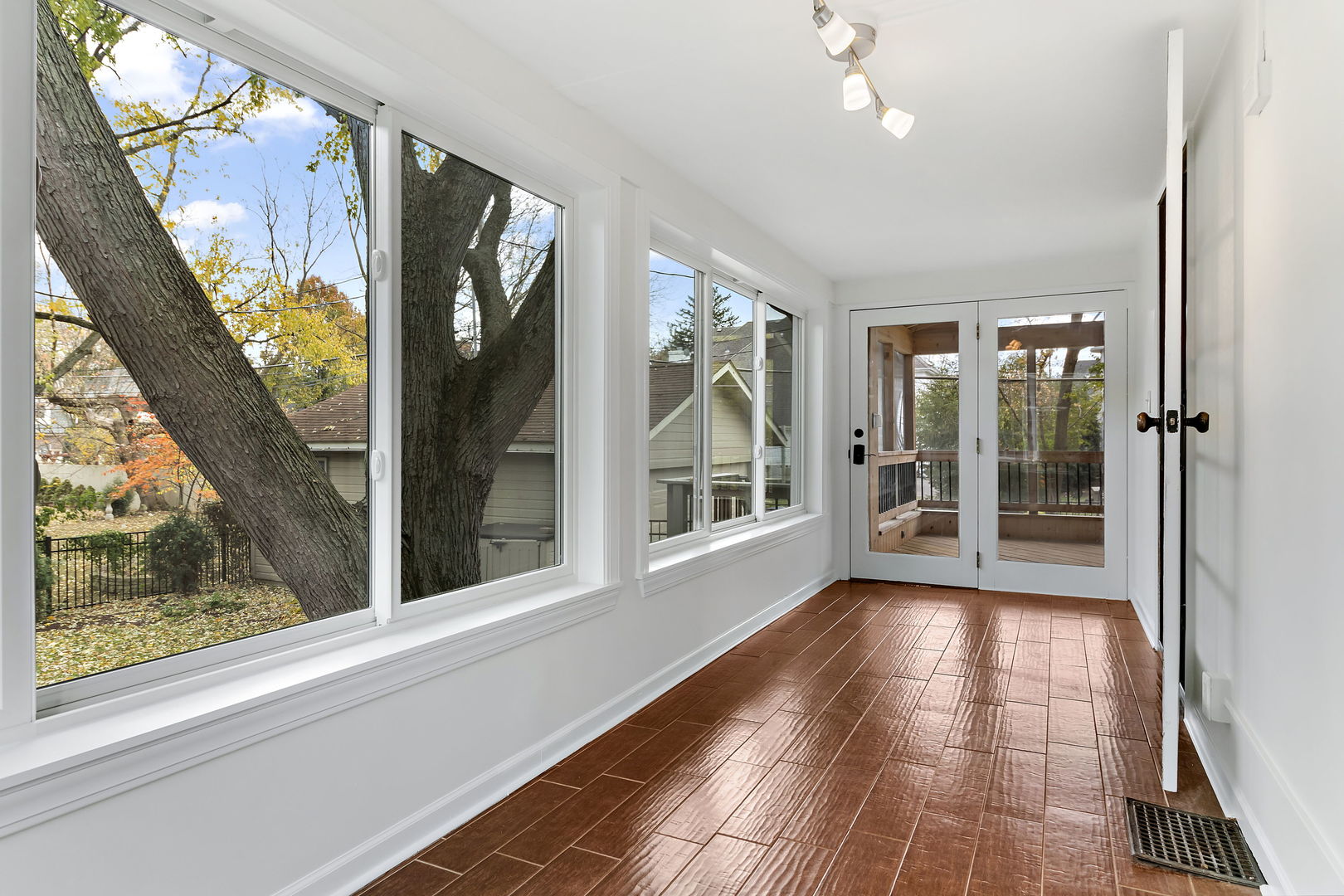 116 South West Street Naperville, IL 60540 - Photo 13 of 35 a view of a glass door with a window