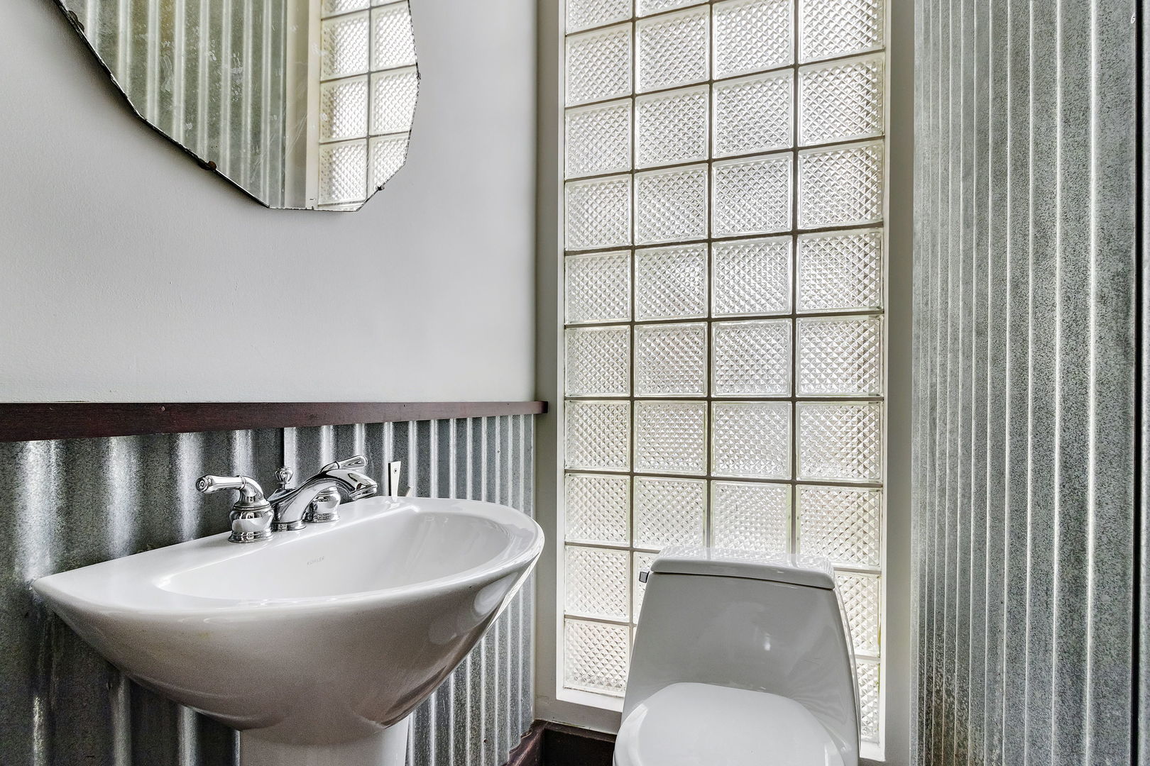 116 South West Street Naperville, IL 60540 - Photo 16 of 35 a bathroom with a sink toilet and mirror
