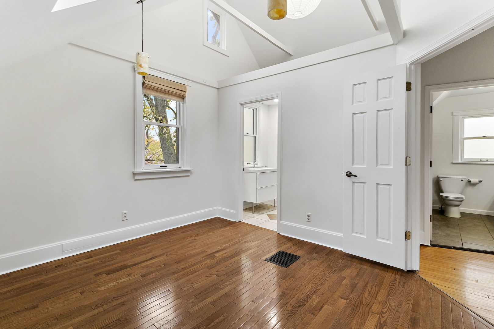 116 South West Street Naperville, IL 60540 - Photo 17 of 35 an empty room with wooden floor and windows