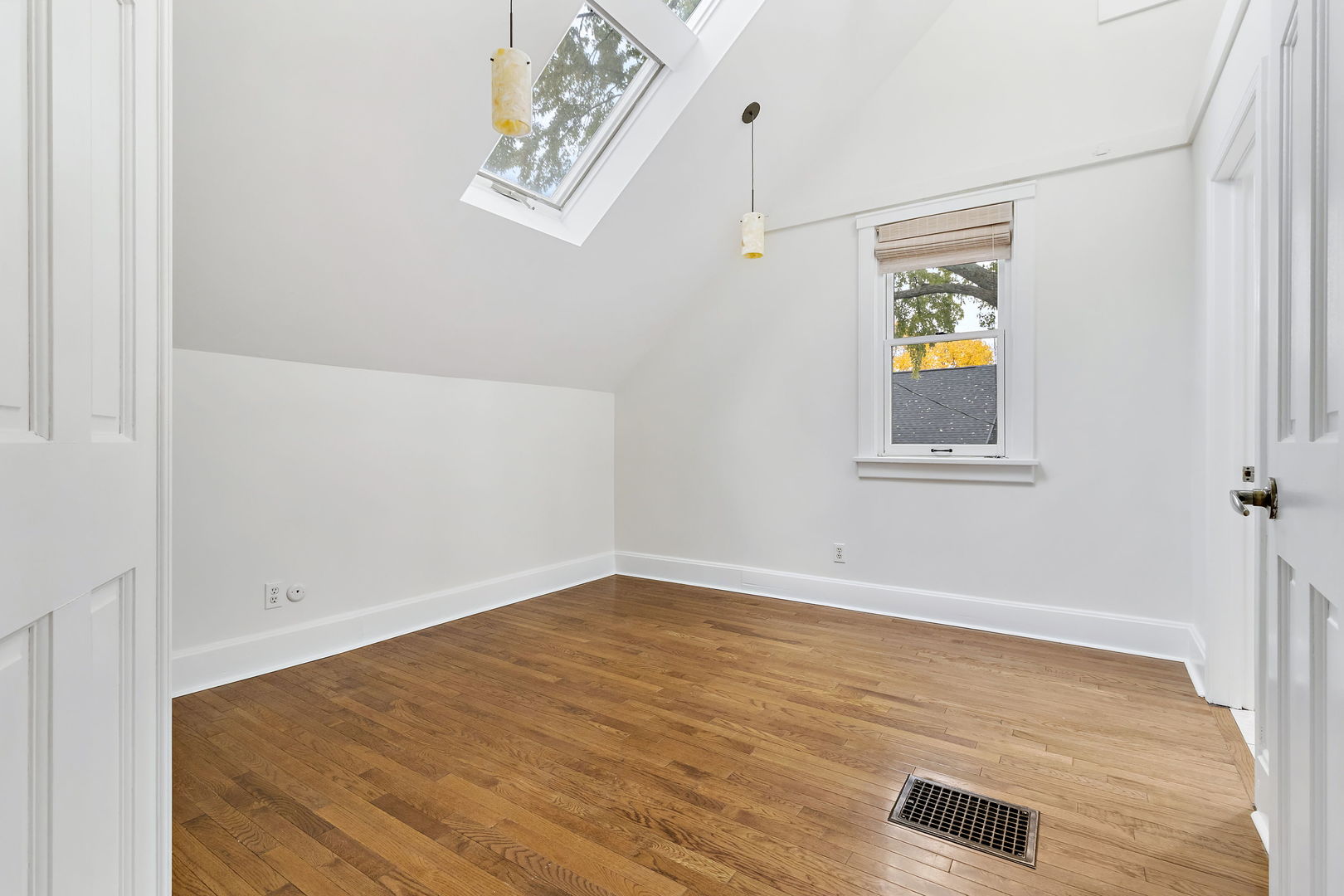116 South West Street Naperville, IL 60540 - Photo 18 of 35 an empty room with window and wooden floor