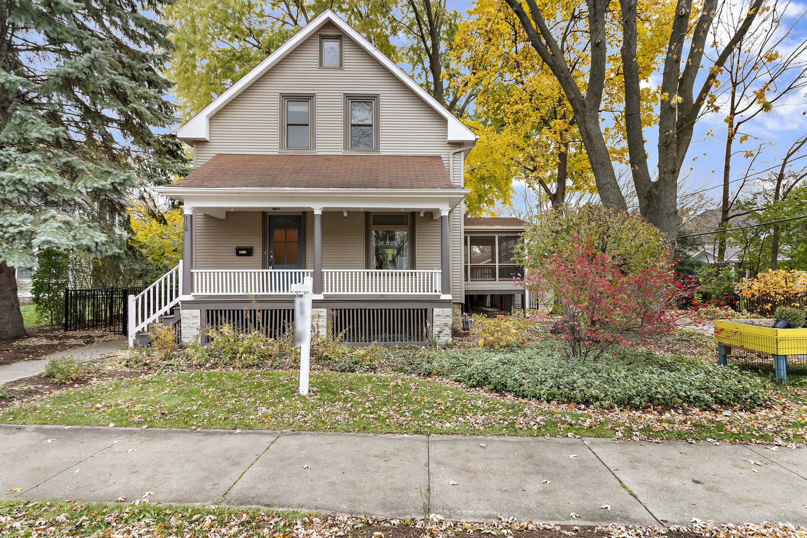 116 South West Street Naperville, IL 60540 - Photo 2 of 35 a front view of a house with a garden