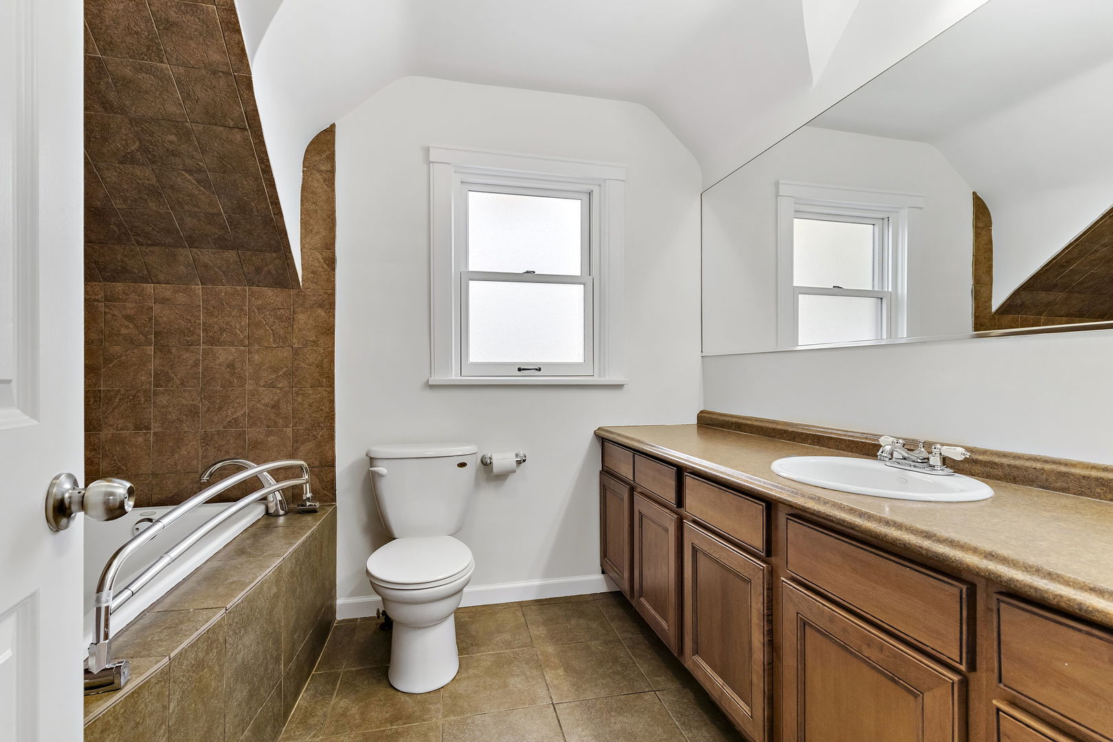 116 South West Street Naperville, IL 60540 - Photo 22 of 35 a bathroom with a granite countertop toilet sink and mirror