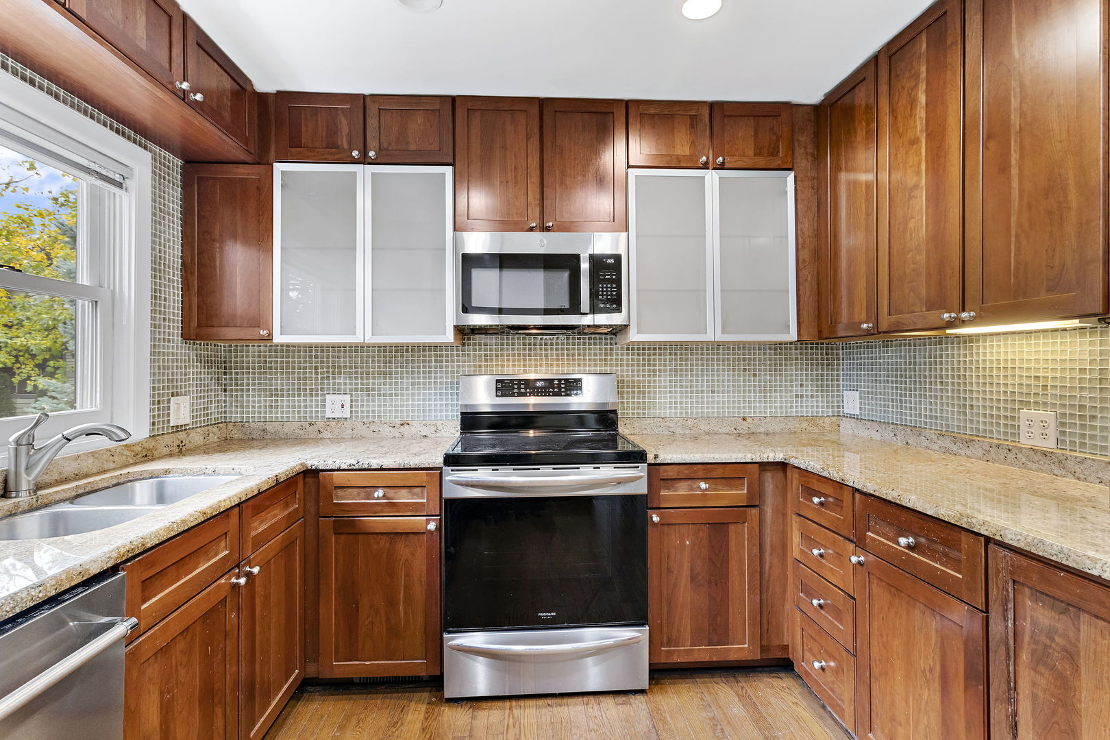 116 South West Street Naperville, IL 60540 - Photo 6 of 35 a kitchen with a stove and a sink
