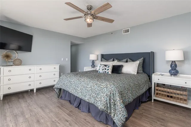 a bedroom with a bed and a dresser