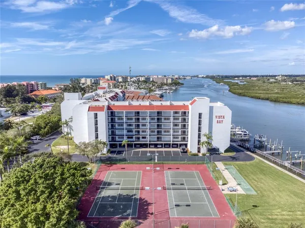 a view of a city with lawn chairs